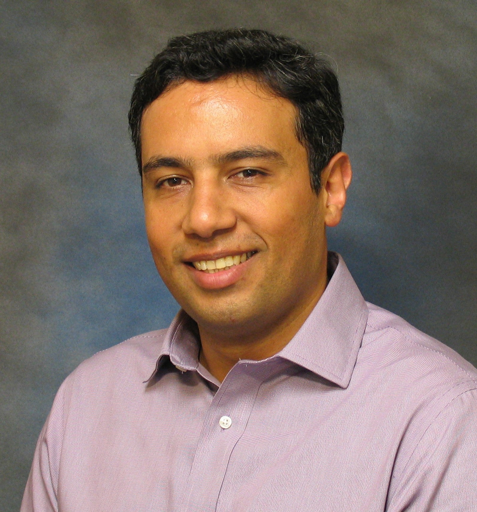 A portrait of Mahdi Rastad