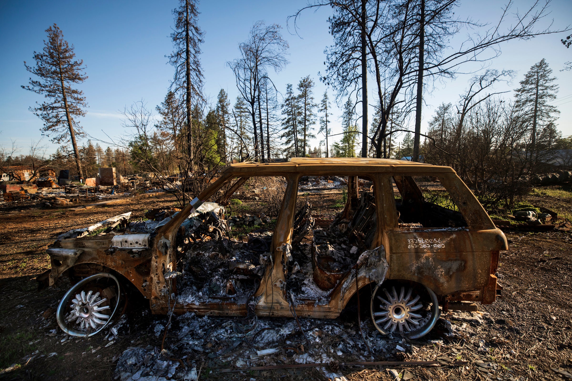 A car destroyed in the 2018 Camp Fire in Paradise California in an April 2019 image