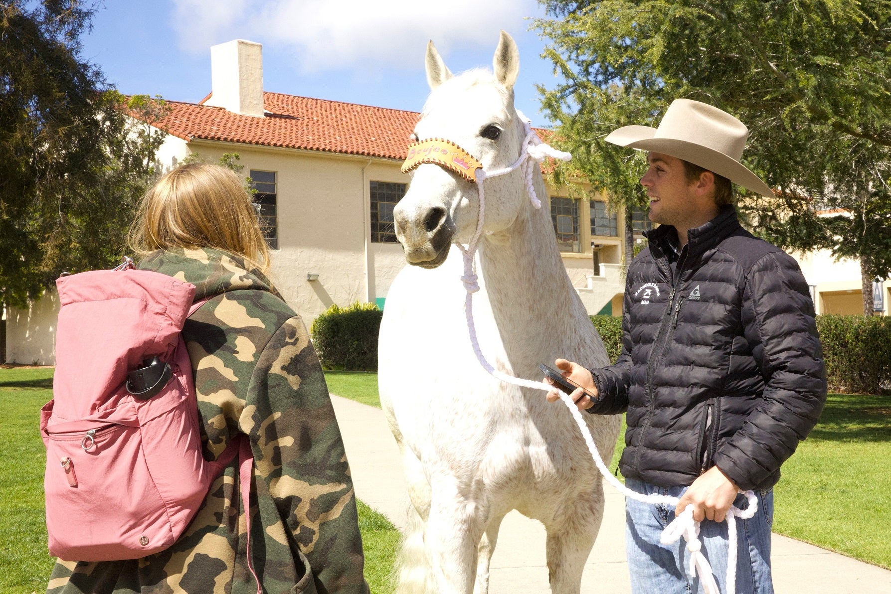 Cal Poly tie-down roper Daniel Miranda and his horse Hersey met with students on Dexter Lawn
