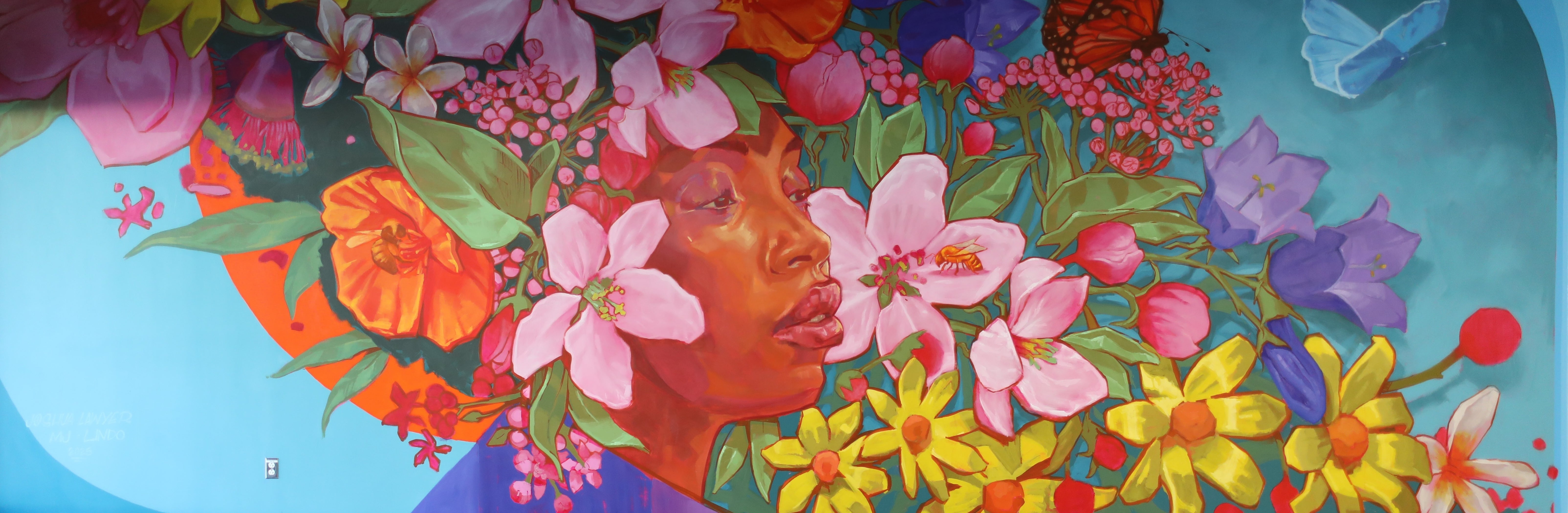 A photo of the mural "Grounds for Growth"