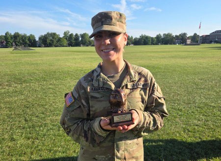 Cadet Gigi Travagline holding the Top Female Army Fitness Award