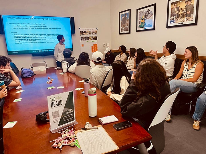 EARD members in a conference room give feedback to architects designing the proposed Lynda and Stewart Resnick Student Success Center