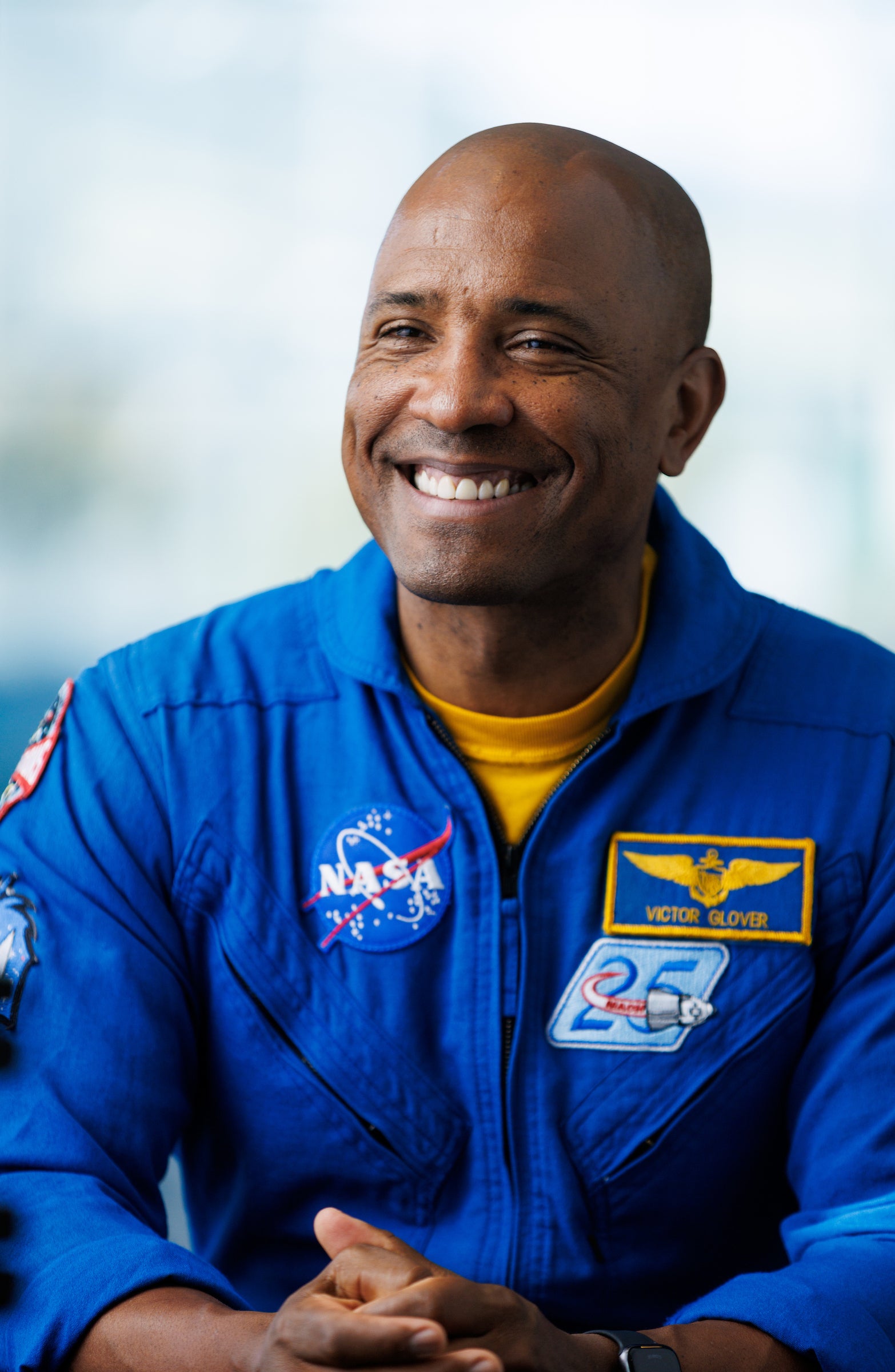 Navy Capt. Victor Glover and a NASA astronaut