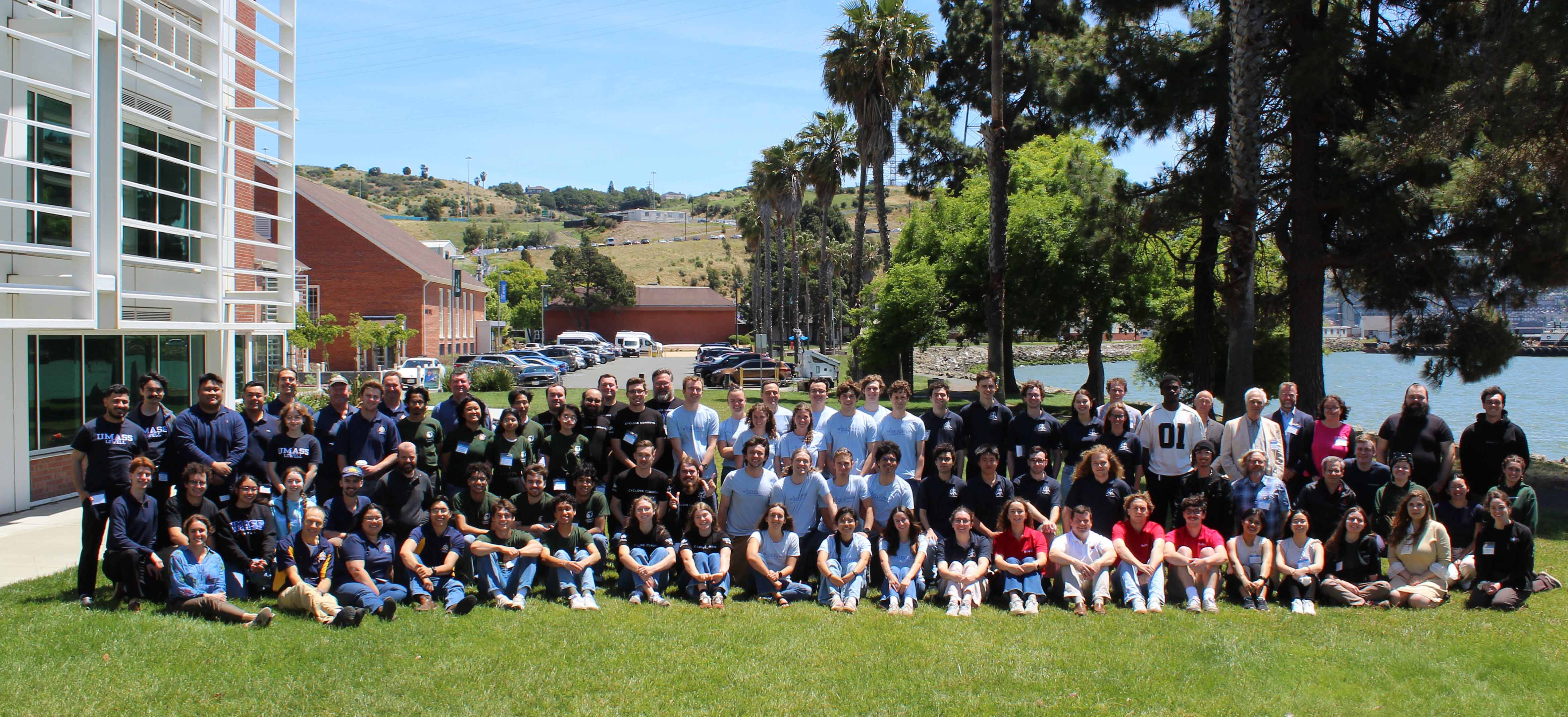 Participating teams in the Western Regional Collegiate Wind Competition at Cal Poly Maritime Academy gather on the lawn