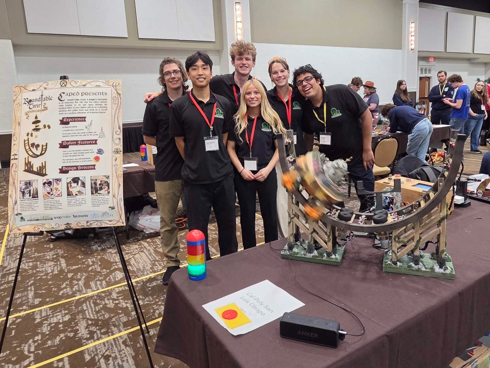 Members of the CAPED team pose with Round Table Twirl: A Knight’s Ascension at the 2026 Ride Engineering Competition in Hershey, Pennsylvania