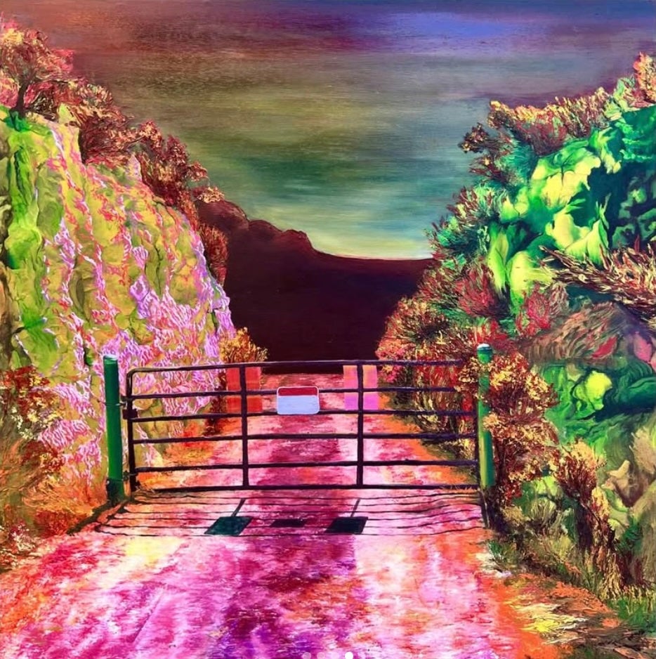 A colorful landscape featuring a rural road with a cattle fence gate