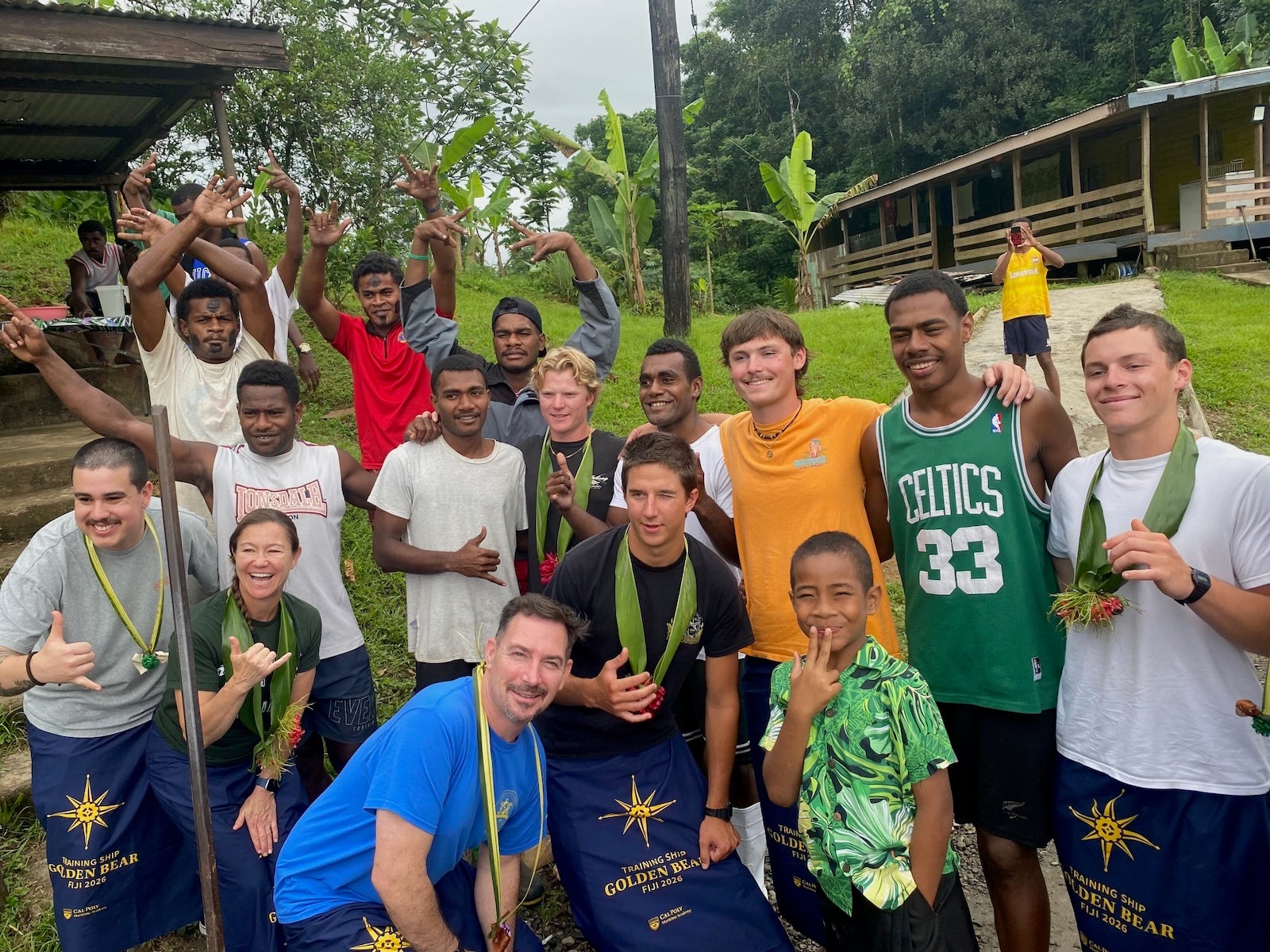 Capt. Samar B. Bannister, crew members and cadets visit a Fijian village during Summer Sea Term as part of the 2026 voyage aboard Training Ship Golden Bear.