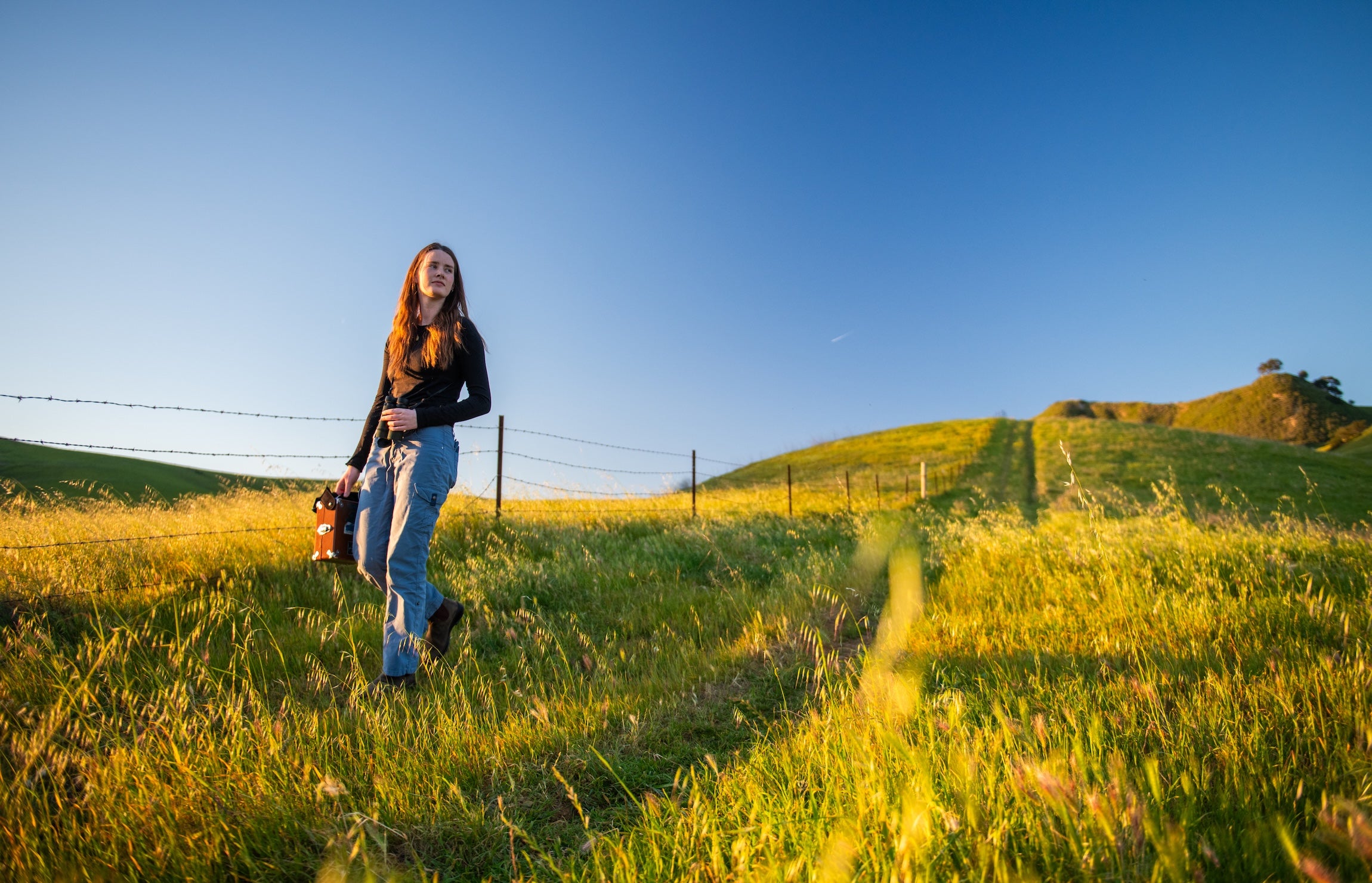 Eva Moylan, a Cal Poly biological sciences master’s degree student, conducts field work in Poly Canyon. 