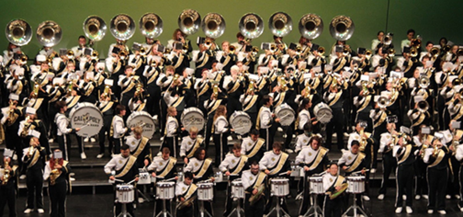 the massive award-winning Cal Poly Marching Band photographed on a stage