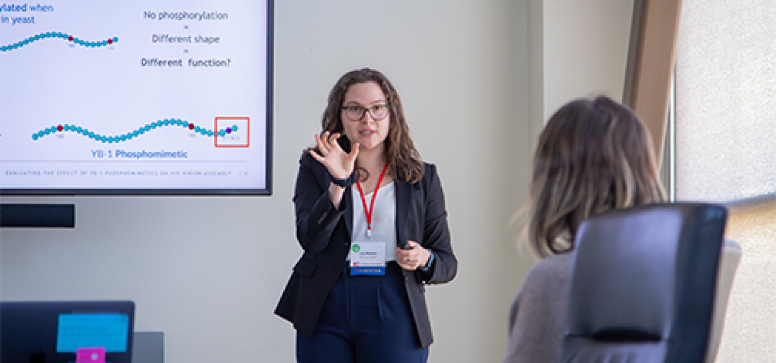 Cal Poly student Lily Nielsen presents her work at the CSU Research Competition held on the Cal Poly campus
