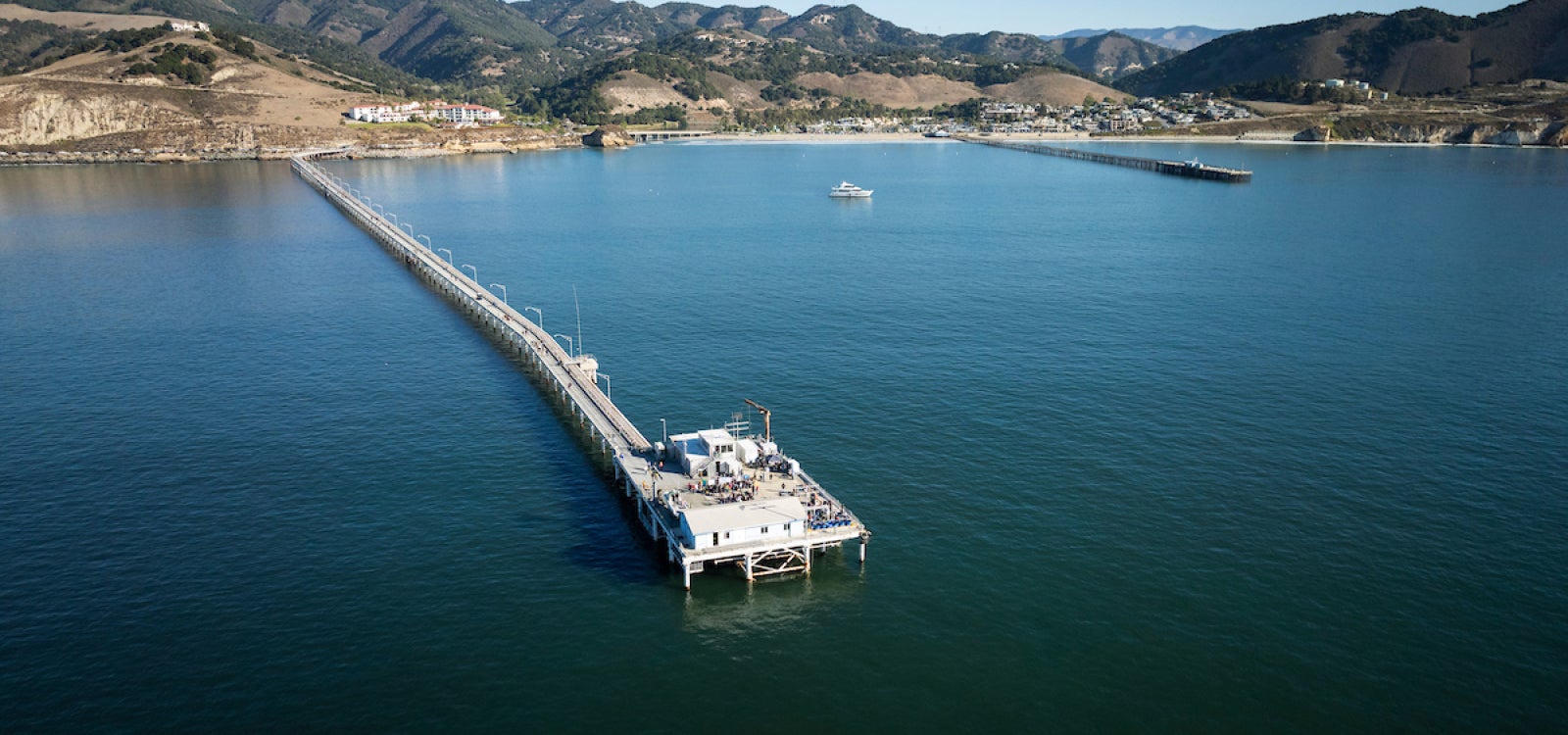 Aerial view of Cal Poly Pier showing coastline and San Luis Obispo Bay