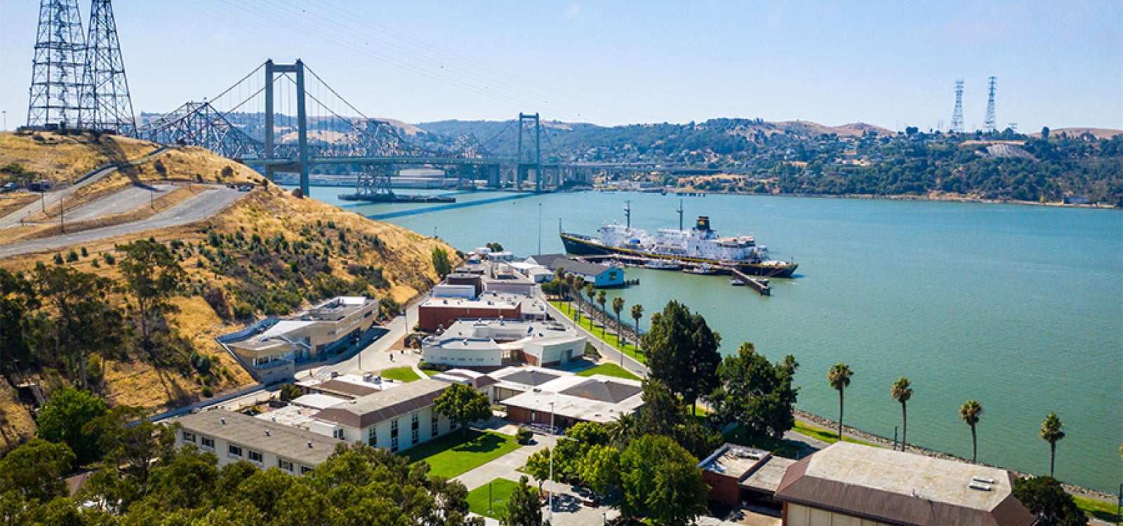 Overview of the Cal Poly Maritime Academy showing part of Suisun Bay and the Golden Bear II vessel