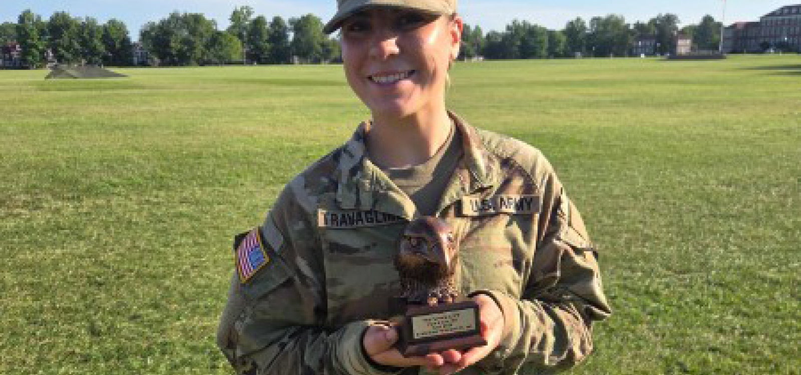 Cadet Gigi Travagline holding the Top Female Army Fitness Award