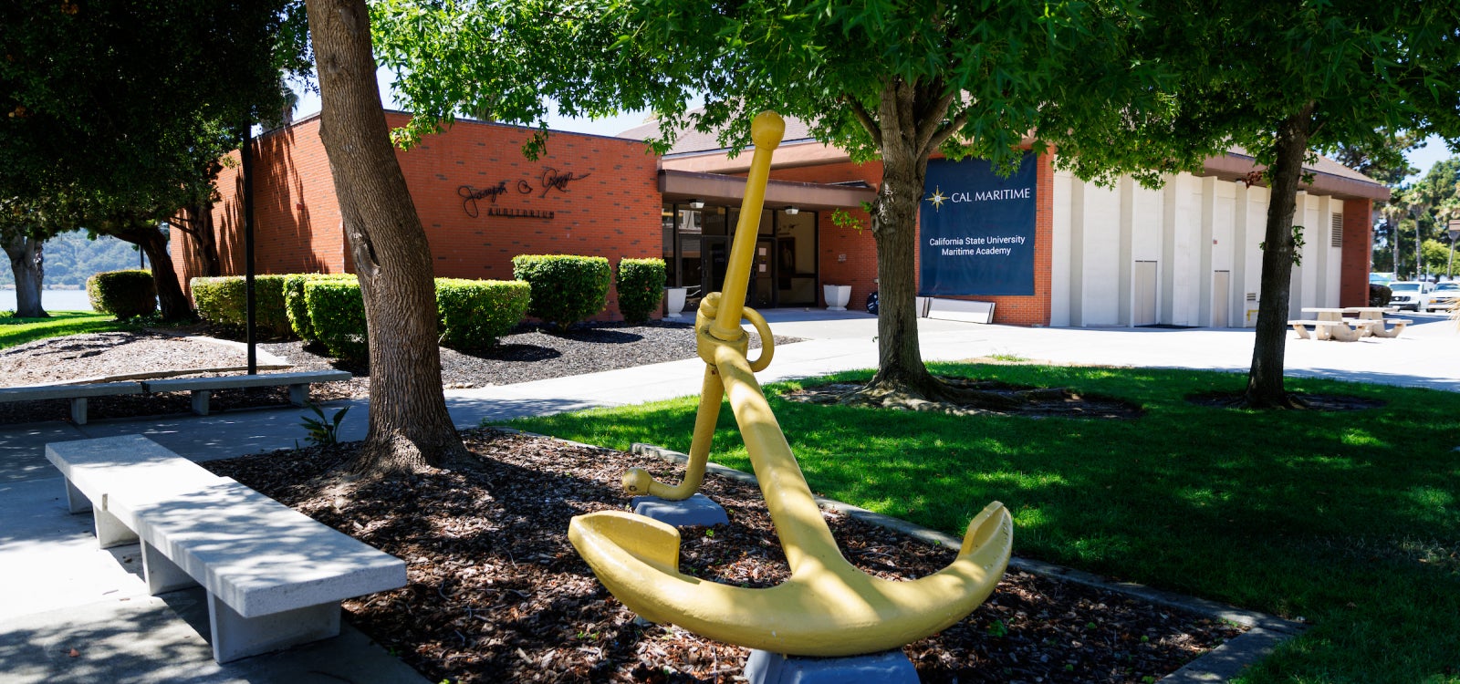 A traditional sea anchor painted yellow on the campus of Cal Poly Maritime Academy