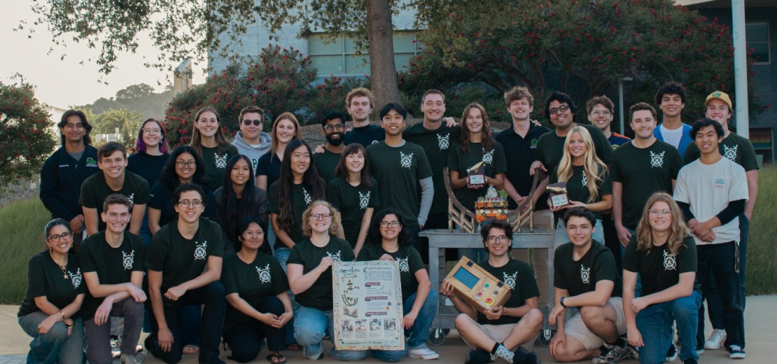 Members of Cal Poly Amusement Park Engineers and Designers, or CAPED, gather in the Cal Poly Engineering Plaza