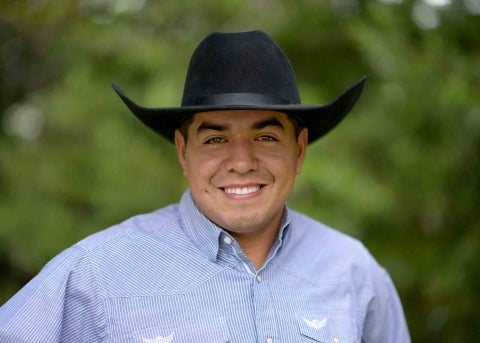 Portrait of Rafael Velazquez-Ramos in a dark cowboy hat