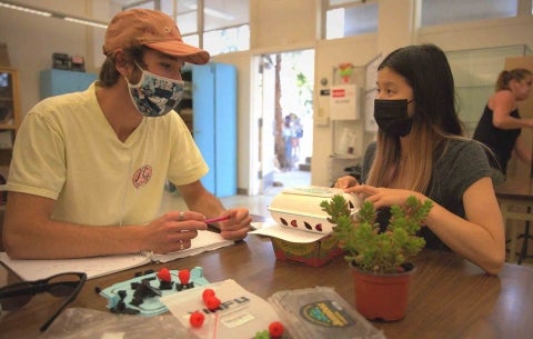 Students with their prototype design in a Cal Poly packaging class