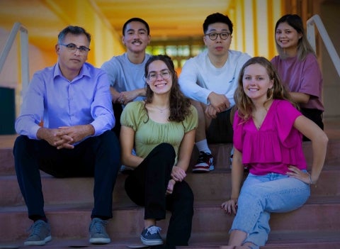 Five members of the award-winning Froot team with their faculty advisor Javier de la Fuente