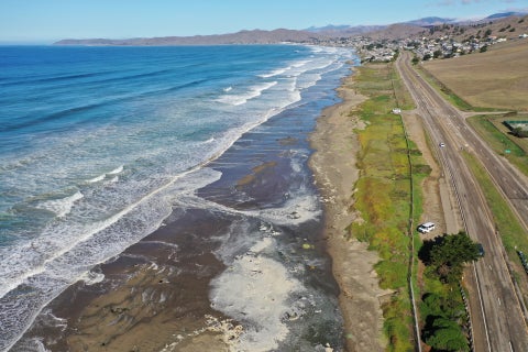 High water from the Nov. 6 king tide reaches the upper shoreline at Morro Strand Dog Beach in Morro Bay.