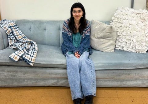 Artist and Central Coast resident Alexa Valenzuela on the studio blue couch