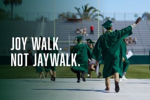 Students in graduation regalia walk and wave in photo with header: Joy Walk. Not Jaywalk.
