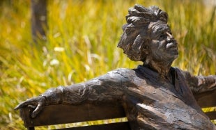 A bench with a statue of Albert Einstein is just outside of the Baker Center of Science and Mathematics