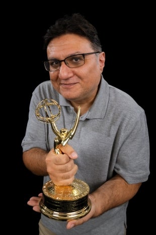Cal Poly computer science professor and co-founder of Digital Democracy, with the Emmy Award