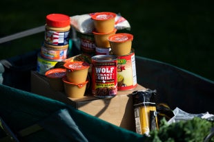 Donated cans and jars of food on a cart