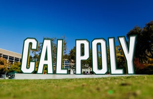 Cal Poly name is spelled out in 3-D lettering near the campus quad