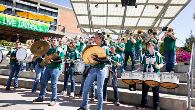 The Mustang band plays at a pep rally held in the UU plaza. 