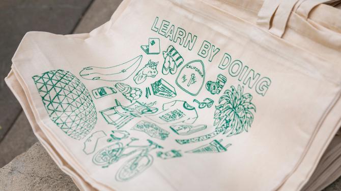 Close up view of a tote bag printed with Cal Poly branding