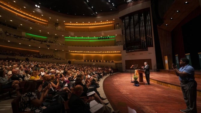 President Armstrong address faculty and staff inside the PAC for Fall Convocation