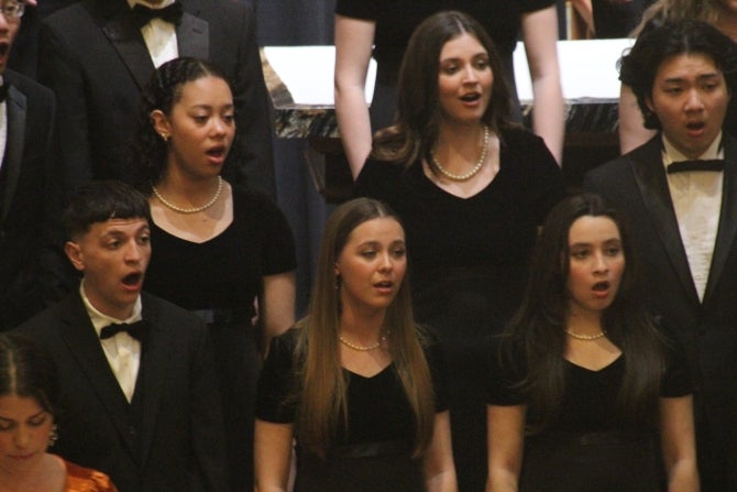 Female and male Cal Poly student singers perform at a 2023 choral concert