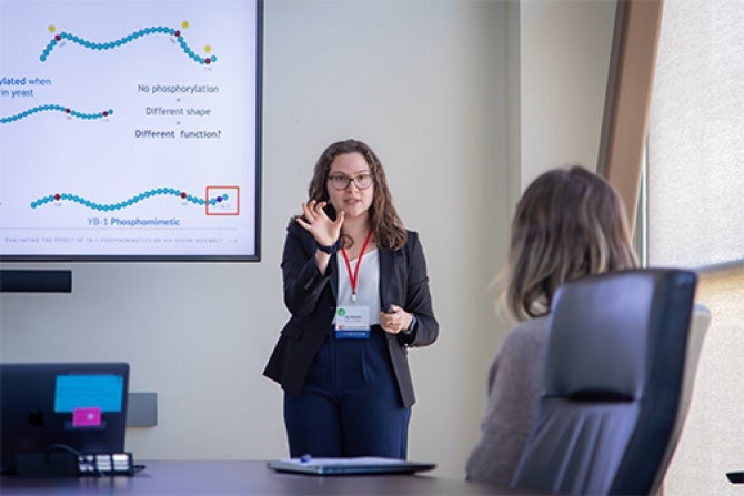 Cal Poly student Lily Nielsen presents her work at the CSU Research Competition held on the Cal Poly campus