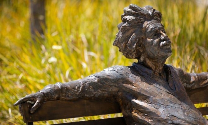 A bench with a statue of Albert Einstein is just outside of the Baker Center of Science and Mathematics