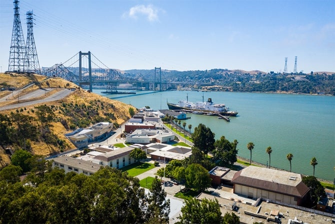 Overview of the Cal Poly Maritime Academy showing part of Suisun Bay and the Golden Bear II vessel