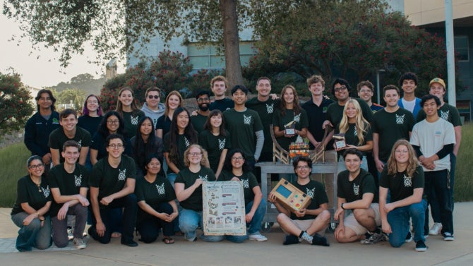 Members of Cal Poly Amusement Park Engineers and Designers, or CAPED, gather in the Cal Poly Engineering Plaza