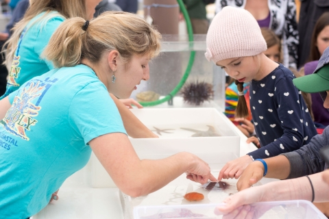 Kids interact with sea life at Cal Poly Pier