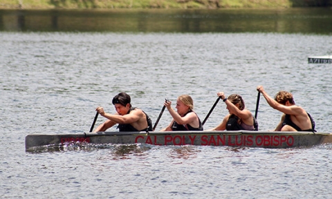 Cal Poly students paddling as a team in their concrete canoe