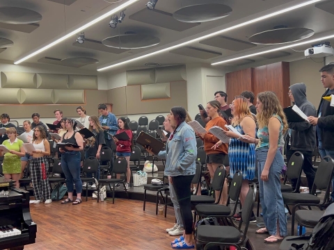 High school students rehearse in a music classroom at the Music Department’s 2022 summercamp
