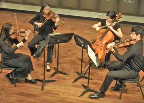 A string quartet, with three violinists and a cellist, will perform during the 2023 Open House Recital