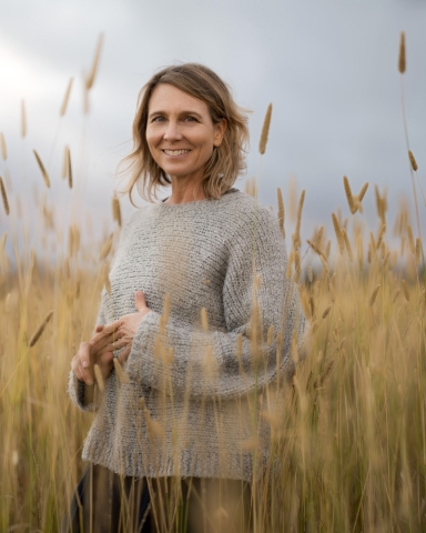 singer-songwriter Inga Swearingen out standing in a field