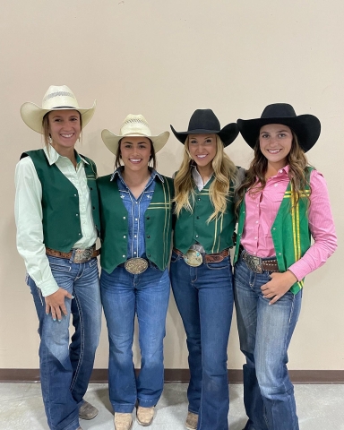 Cal Poly Rodeo team members stand together