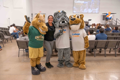 al Poly Dean of Students Joy Pedersen poses with mascots from Cal Poly-Musty the Mustang-Cuesta-Cougie the Cougar-and Allan Hancock-New Spike the Bulldog-colleges
