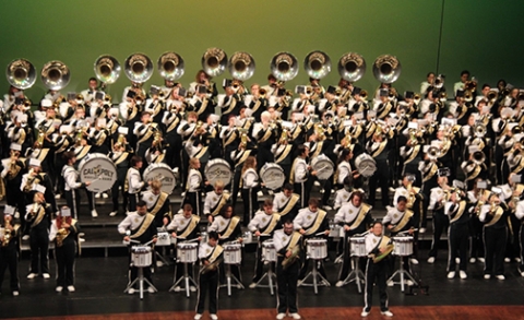 the massive award-winning Cal Poly Marching Band photographed on a stage