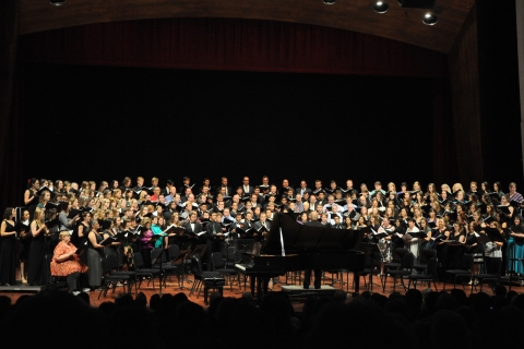 Cal Poly full choir crowds the stage during a performance