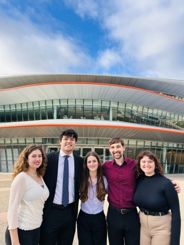 Five Cal Poly student soloists pose outside the Performing Arts Center