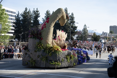 A view of the back of the Cal Poly Universities 2025 Rose Float entry Nessies Lakeside Laughs heading east on Colorado Blvd