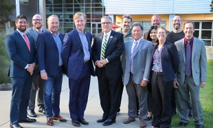 Cadence executives pose with Cal Poly Engineering leadership