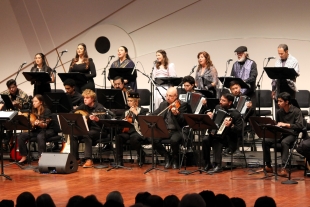 Musicians of the Cal Poly Arab Music Ensemble perform onstage at the PAC